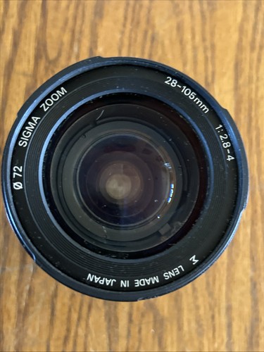 Sigma 105 8 - sigma, d